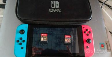 nimtendo switch 2 giochi e cassa 