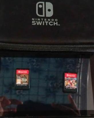 nimtendo switch 2 giochi e cassa 