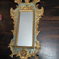specchio da parete in legno dorata e decorato