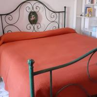 Letto matrimoniale in ferro battuto verde anticato