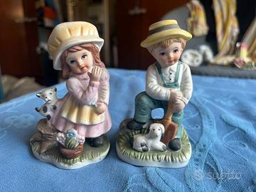 Coppia di statuette Capodimonte colorate