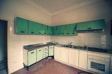 Cucina interamente in acciaio inox anni '80