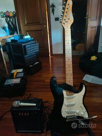 chitarra elettrica, amplificatore e microfono 