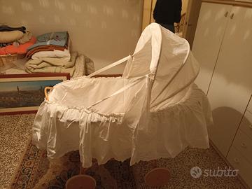 culla in vimini e pizzo sangallo