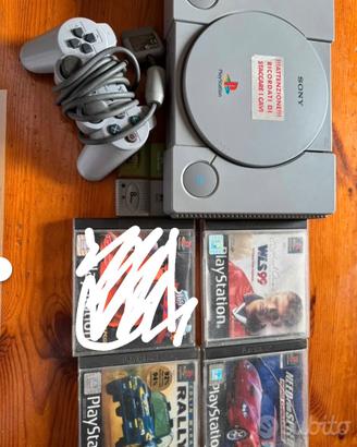 PlayStation one con giochi
