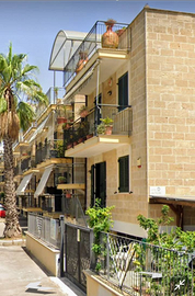 Appartamento con scoperto e posto auto ottime cond