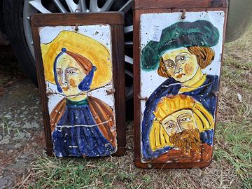 Coppia dipinti su mattonella in terracotta
