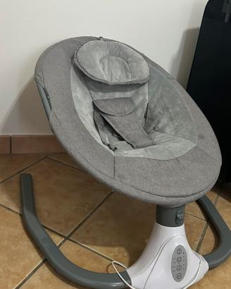 Dondolo elettrico per neonato – Pari al nuovo
