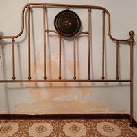 Testiera in ottone antico con rosone  floreale 