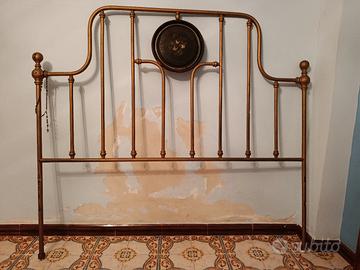 Testiera in ottone antico con rosone  floreale 