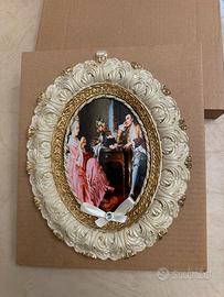 Quadro con cornice ovale avorio e oro