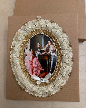 Quadro con cornice ovale avorio e oro