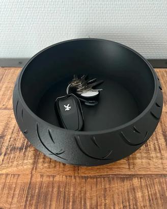 SVUOTA TASCHE A FORMA DI PNEUMATICO