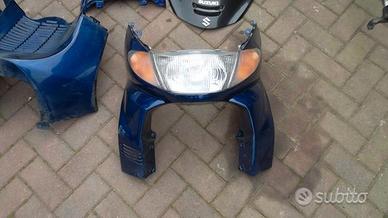 Burgman 400 '06: faro km forcella scudo pompa