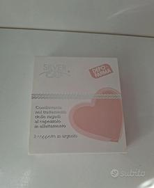 Paracapezzoli in argento