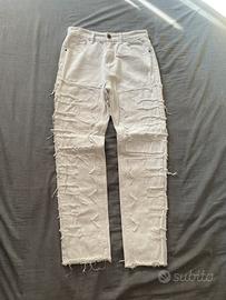 Jeans bianchi strappati taglia M