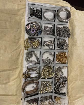 Collane unisex bracciali anelli orecchìni,