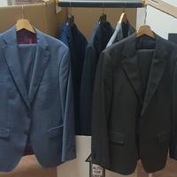Camice classiche,  vestiti completi e giacche.