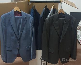 Camice classiche,  vestiti completi e giacche.