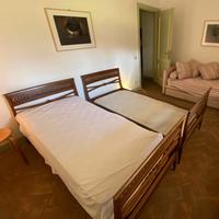 coppia di letti in legno