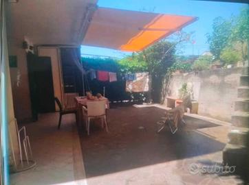 Piano terra con giardino vista mare