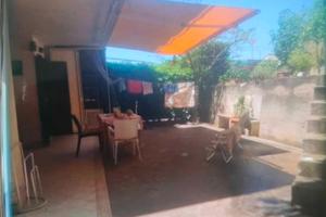 Piano terra con giardino vista mare