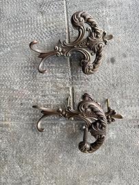 Appendiabito vintage in metallo brunoto