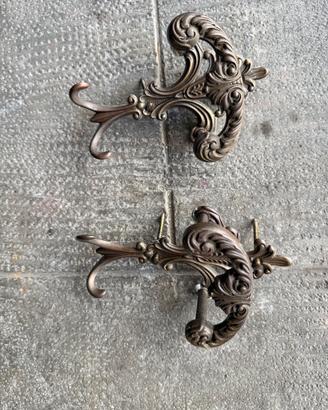 Appendiabito vintage in metallo brunoto