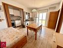 bilocale-arredato-vista-mare-con-posto-auto