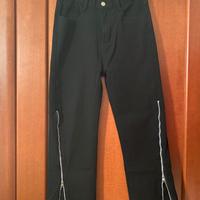 Jeans flared con zip