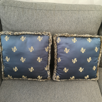 Cuscini in raso operato