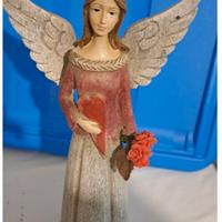 Angelo in ceramica dipinta