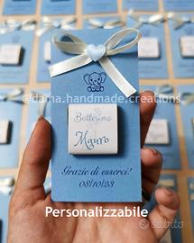 Segnaposto con cioccolatino e menú centrotavola