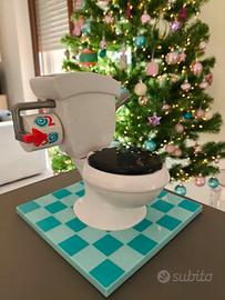 WC con coperchio apribile e suoni realistici
