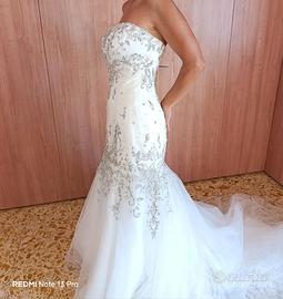 Splendido Vestito impreziosito di punti luc.