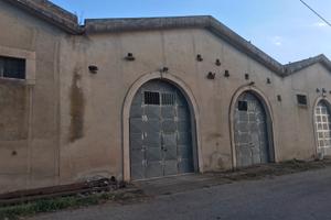 Magazzino + casa diruta