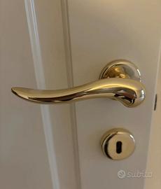 coppia maniglie modello Peter Colombo, color oro