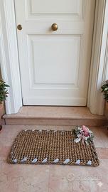 Zerbino in corda artigianale con decorazioni flore