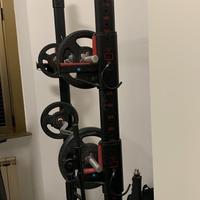 Completo con panca e pesi