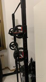 Completo con panca e pesi