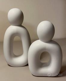 coppia statue
