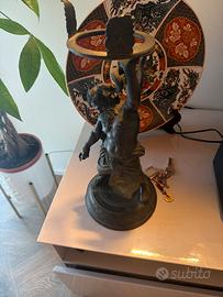 Scultura atlante in bronzo