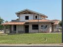 villa-nuova-costruzione-al-grezzo-con-giardino