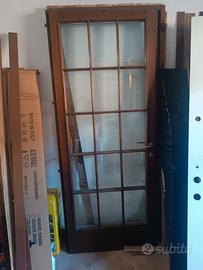 Porta in legno massello +grata in ferro con telaio