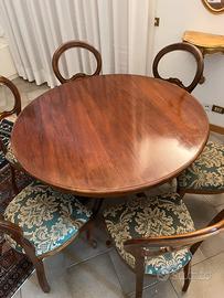 Tavolo rotondo in legno con 6 sedie