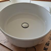 Lavabo da appoggio rotondo in ceramica bianca