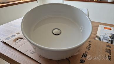 Lavabo da appoggio rotondo in ceramica bianca
