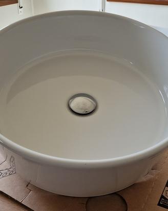 Lavabo da appoggio rotondo in ceramica bianca