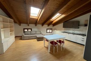 Appartamento mansardato con garage da un posto aut