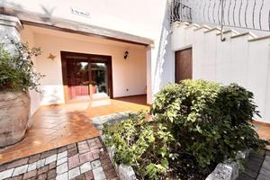 Trilocale al piano terra con giardino e cantina ne